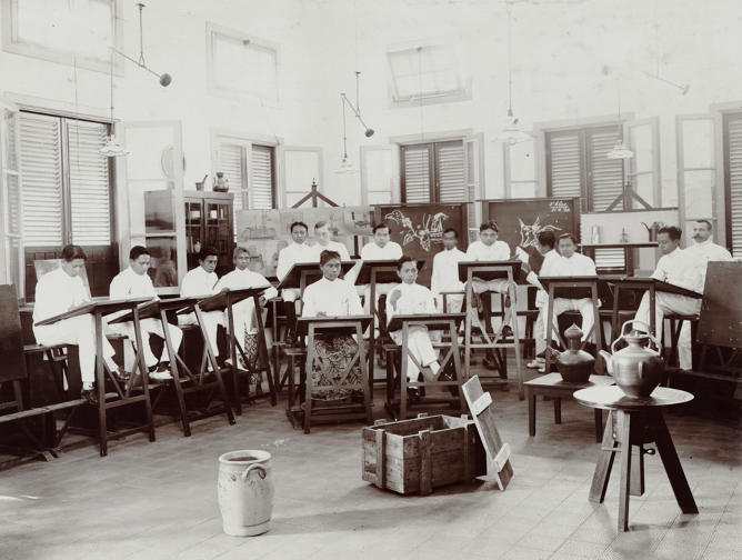 Figure 4. ‘Students and teachers in the drawing room of the Agricultural School in Buitenzorg (1920).’ Source: Leiden University Libraries, Digital Collections, Southeast Asian and Caribbean (KITLV) Images, KITLV A173.