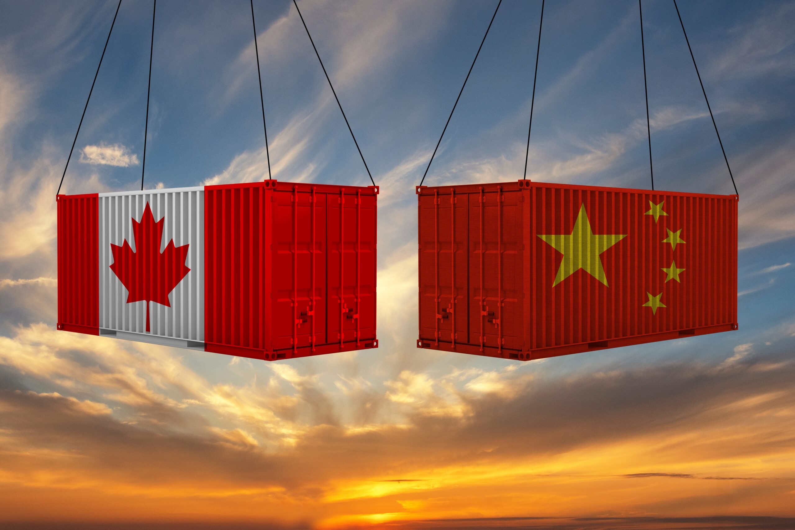 Chinese,And,Canadian,Flag,Container,Hanging,In,A,Sky.,Concept