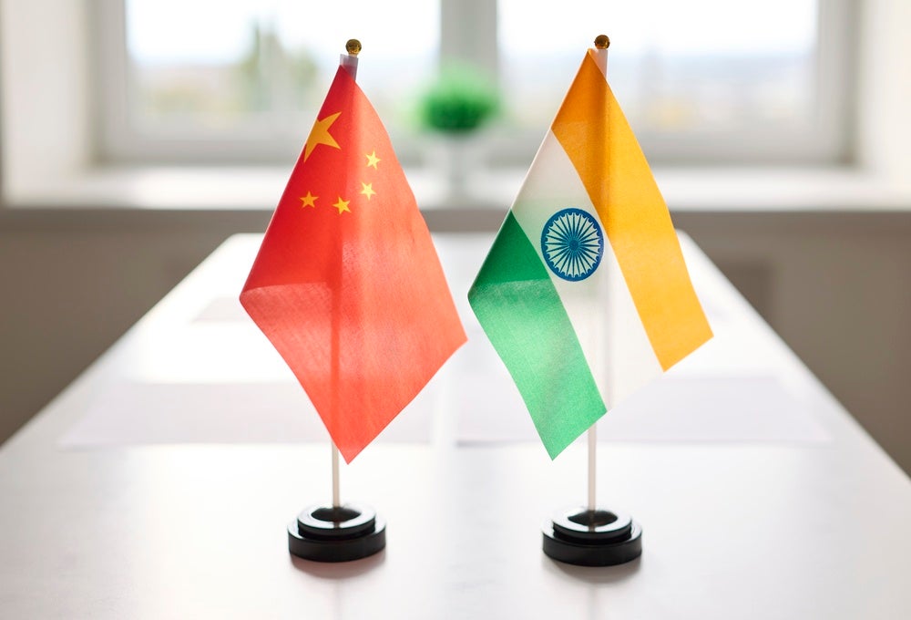 Flags,Signal,Diplomacy,During,A,Meeting,Table,Negotiation.,Paired,Desk